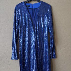 Only worn once! bebe blue sequin dress. Sex low V!